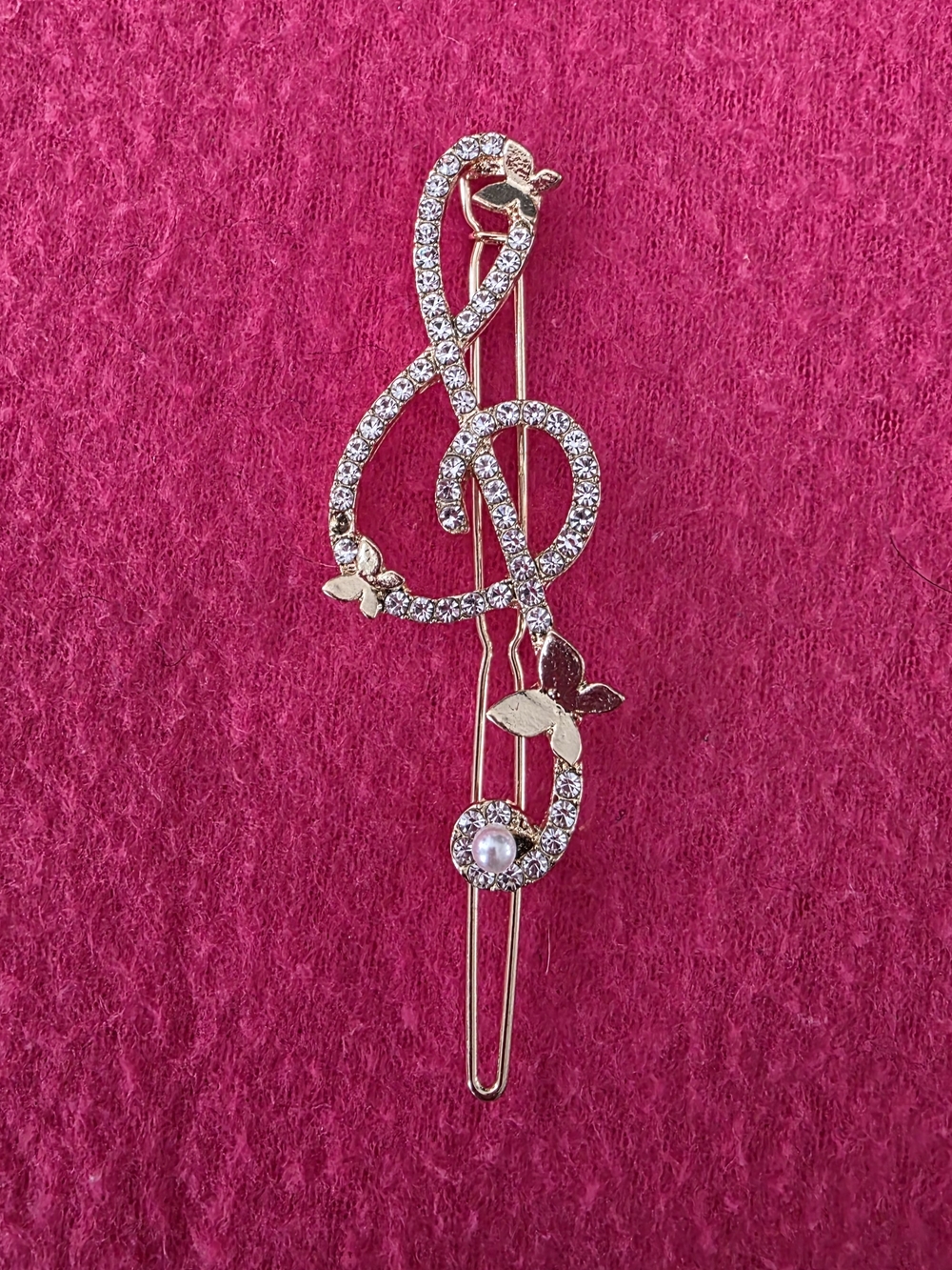 Gold-tone Treble Clef Hair Pin featuring sparkly rhinestones, delicate butterfly